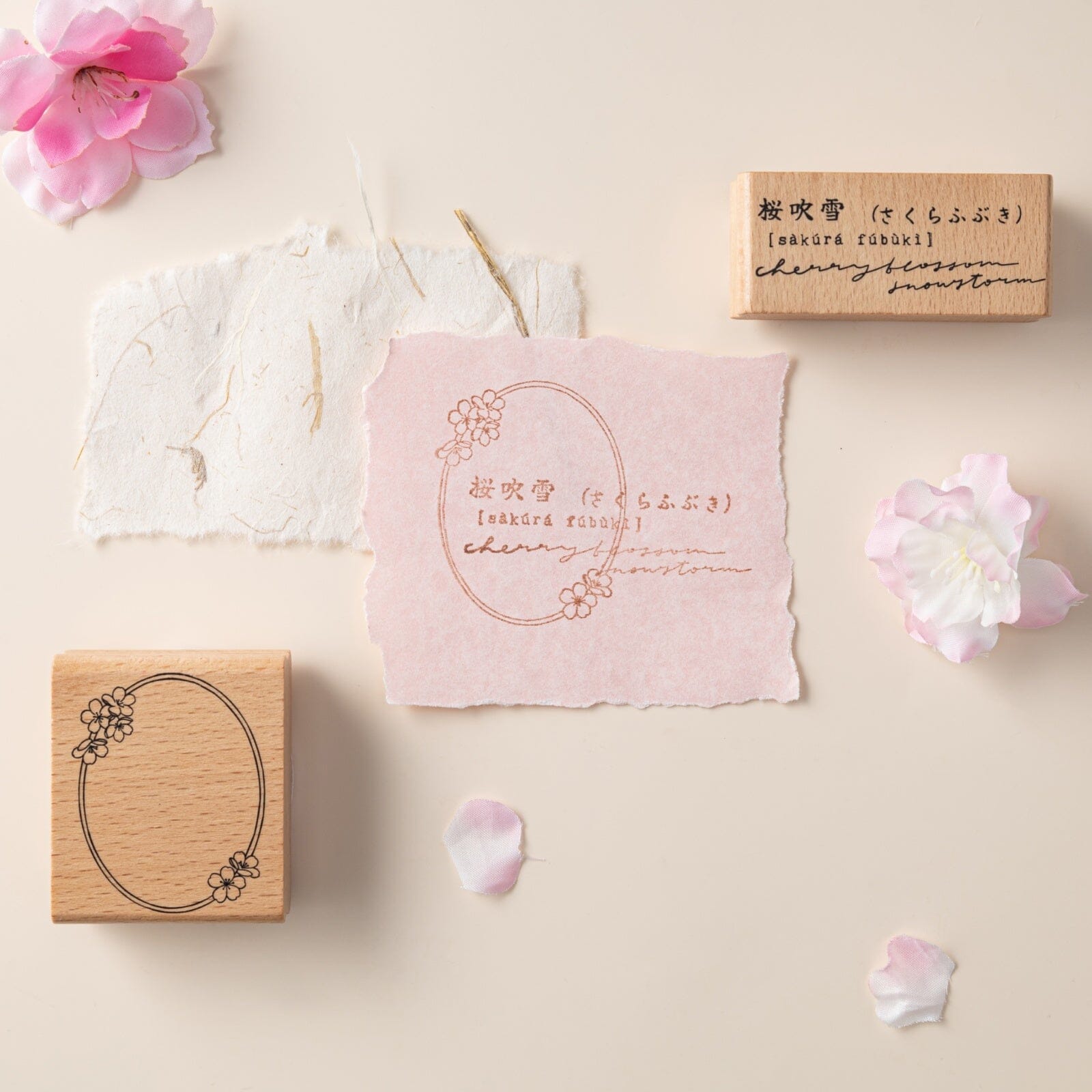 Sakura fubuki stamp with cherry blossom frame stamp on pink paper