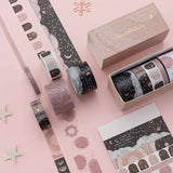 Constellations washi tape set laid out on pink background