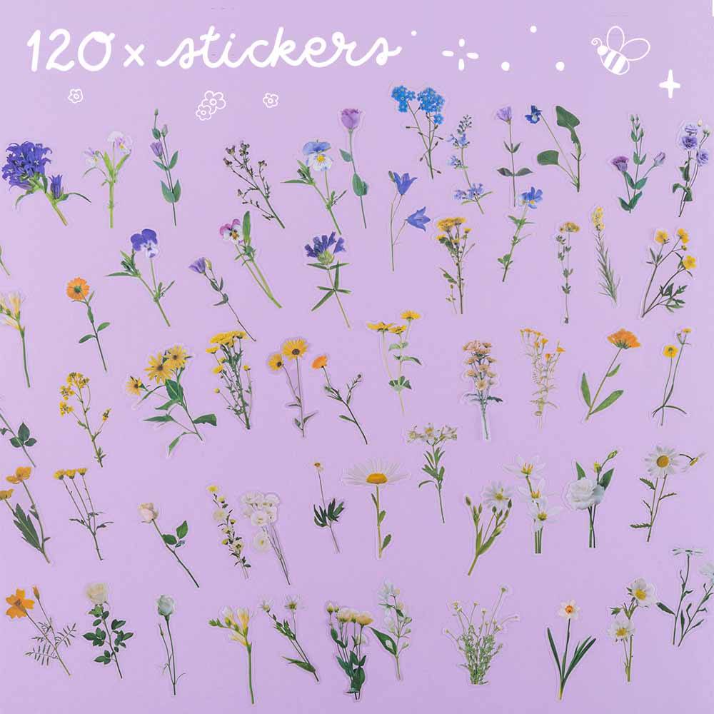 120x pressed flower stickers laid out on purple background with text “120x stickers”