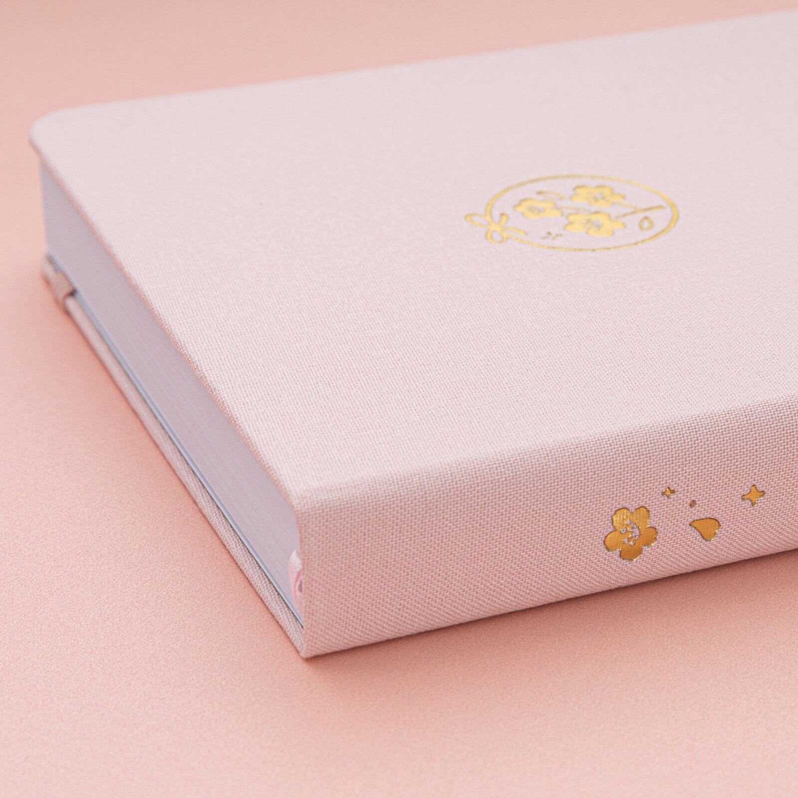 Tsuki Sakura Breeze limited edition bullet journal by Notebook Therapy spine gold foil details