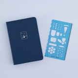 Tsuki Bullet Journal Set in Sky Blue with Tsuki 'Winter Wishes' Limited Edition Bullet Journal on Light Blue Background
