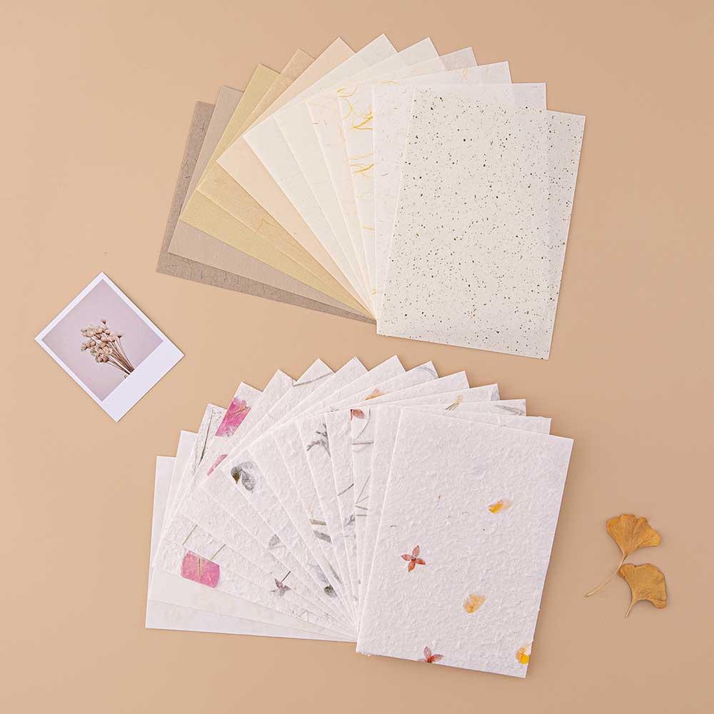 Tsuki Handmade Petal Paper Pack with Tsuki Mixed Scrapbook Paper with autumn leaves and polaroid picture on beige background