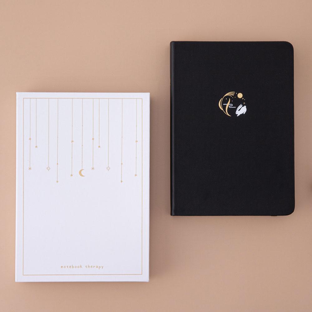 Tsuki ‘Moonlit Wish’ Limited Edition Bullet Journal with luxury gift box packaging on light brown background
