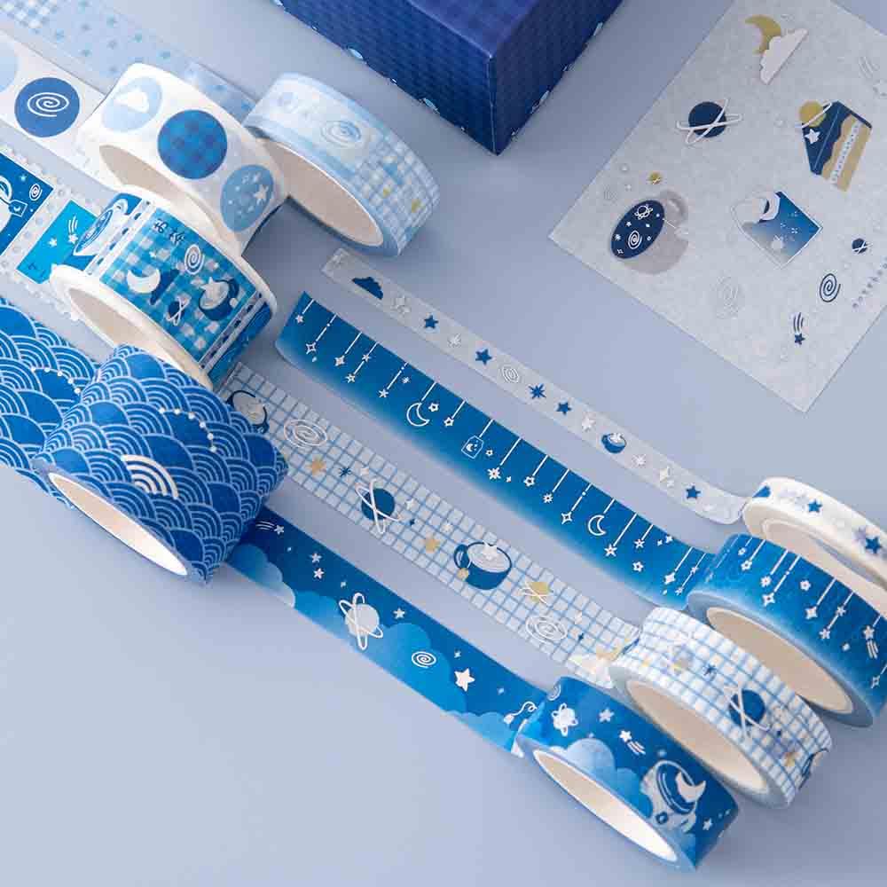 Close up of Tsuki ‘Cup of Galaxy’ Washi Tapes on light blue background