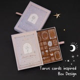 Opened Tsuki ‘Moonlit Alchemy’ stamps and text that says “tarot cards inspired box design"