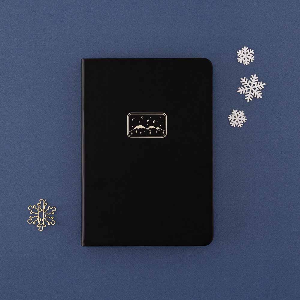 Tsuki ‘Winter Journey’ Limited Edition Bullet Journal with free paperclip gift and snowflakes on navy background