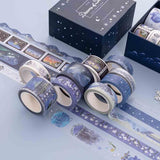 Close up of Tsuki ‘Dreams of Snow’ Holographic Washi Tape Set on light blue background