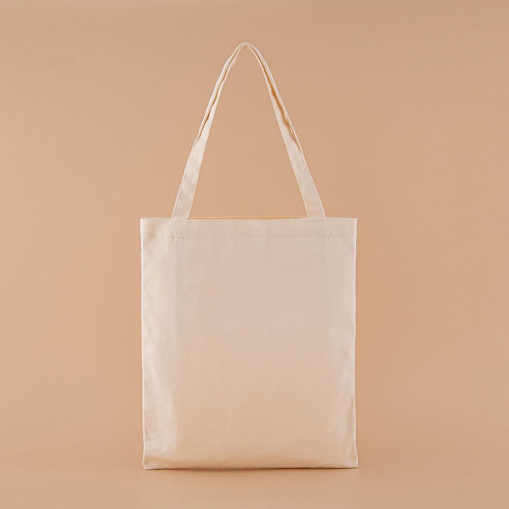 The back of Tsuki ‘Vintage Kinoko’ Tote Bag in beige background