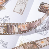 Close-up of film strip tape with romantic images