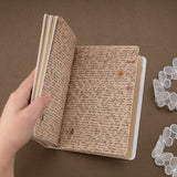 Printed pages with handwriting and flower petals