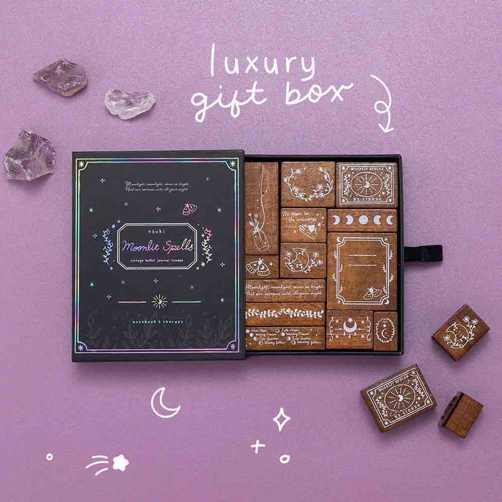 Tsuki ‘Moonlit Spells’ Bullet Journal Stamp Set with luxury gift box with amethyst stones on purple background