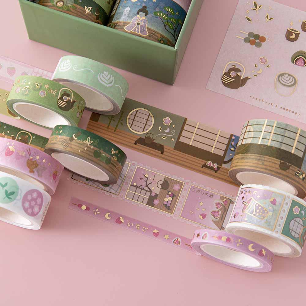 Close up of Tsuki ‘Matcha Ichigo’ Washi Tape Set on light pink background