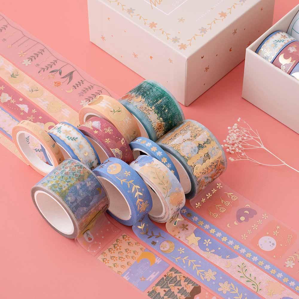 Close up of Tsuki ‘Moonflower’ Washi Tape Set with luxury eco-friendly box packaging with flowers on coral pink background