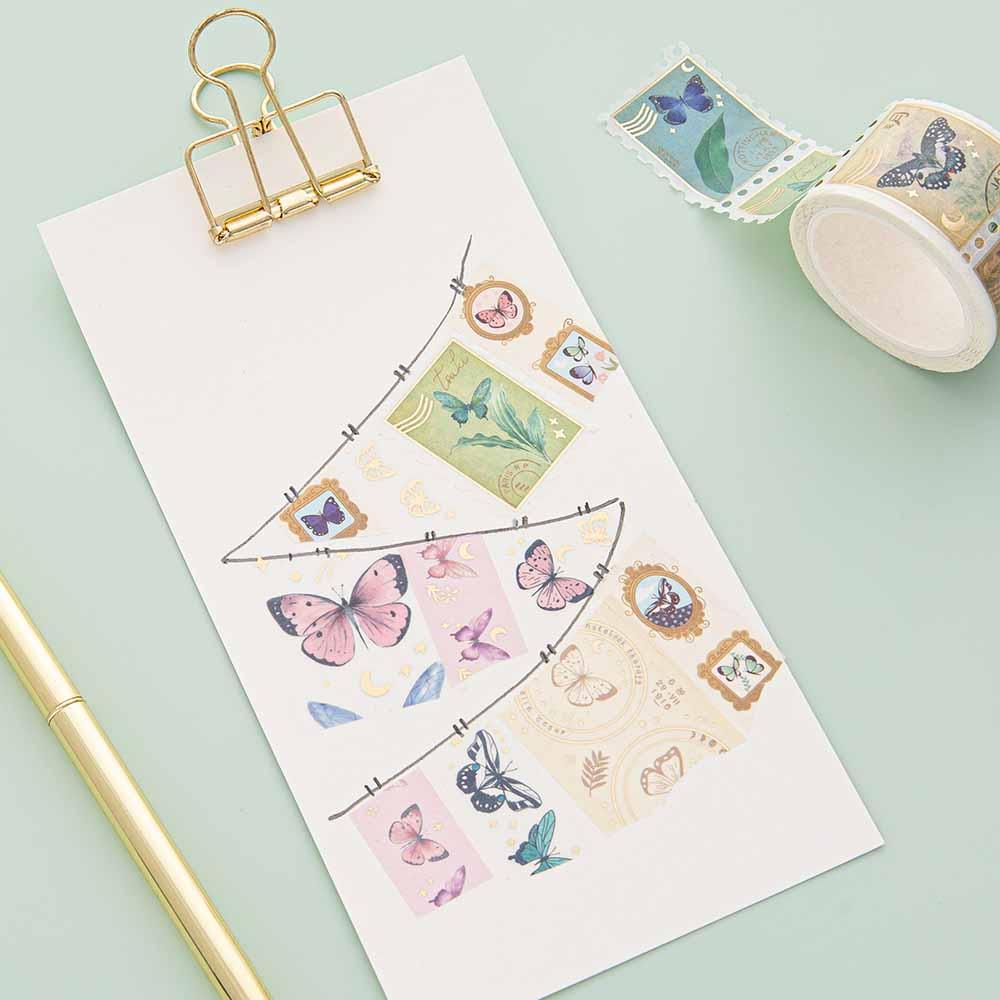 Tsuki ‘Flutter + Dream’ Washi Tapes by Notebook Therapy x Pelinkan on white clipboard with gold pen on mint background