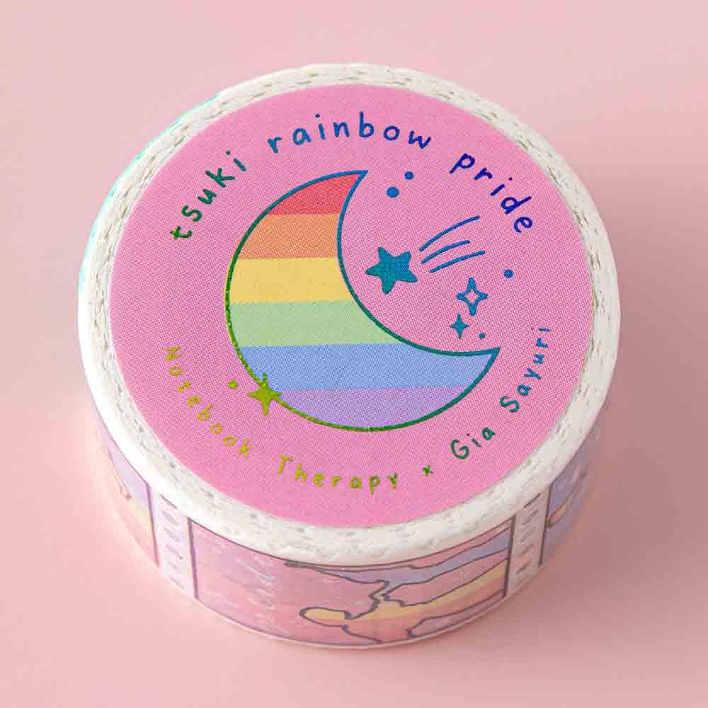 Close up of Tsuki Rainbow Pride Washi Tape by Notebook Therapy and Gia Sayuri on light pink background