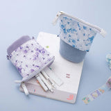 Tsuki Endless Summer Pop-Up Pencil cases in Lilac Bloom and Petal Blue with Tsuki Endless Summer Washi Tape roll in light blue background