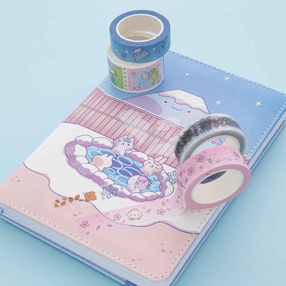 Tsuki ‘Four Seasons’ Washi Tapes by Notebook Therapy x Milkkoyo on Tsuki ‘Four Seasons: Winter Edition’ Bullet Journal on light blue background