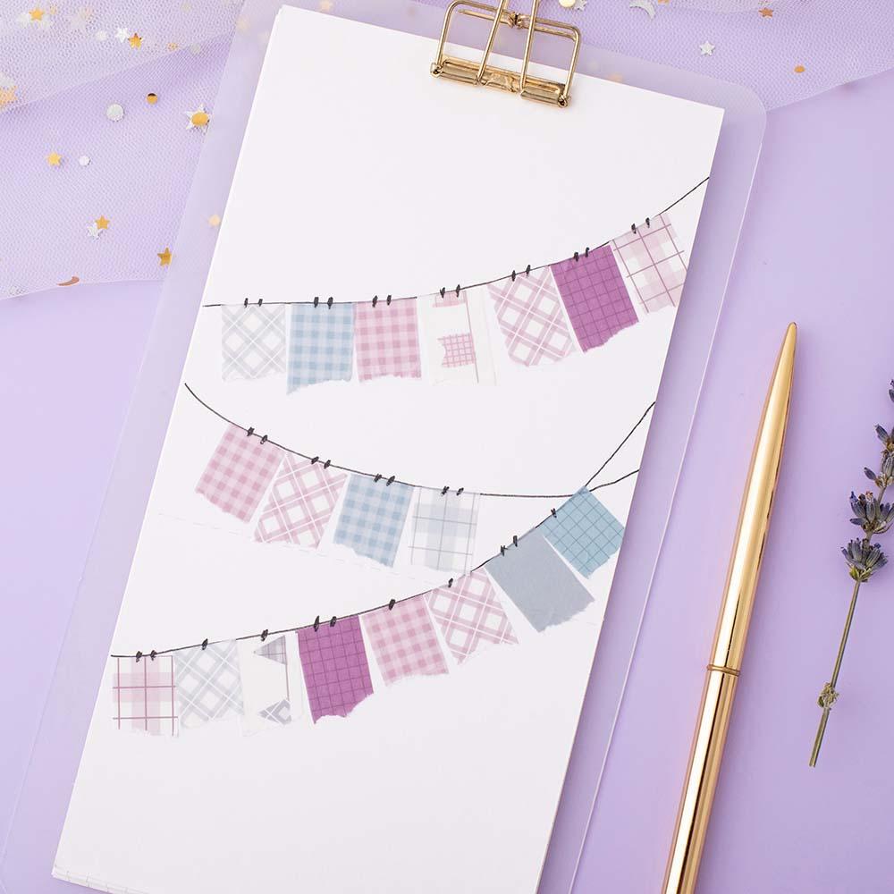 Tsuki Core Washi Tape Set in Cool Neutral on white card with flowers and pen on lilac background