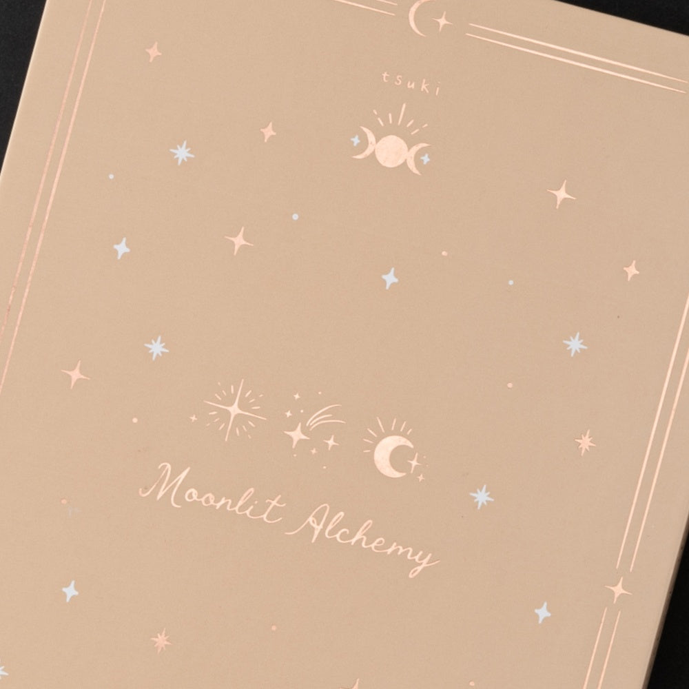 Close up of Moonlit Alchemy gift box in beige