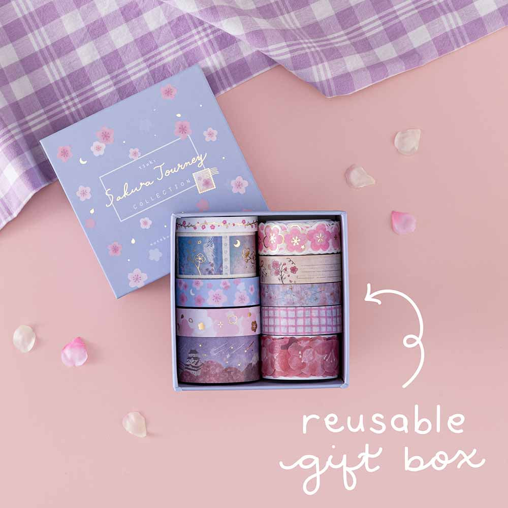 Tsuki ‘Sakura Journey’ Washi Tape Set with reusable tsuki gift box with lilac gingham cloth and cherry blossom petals on light pink background