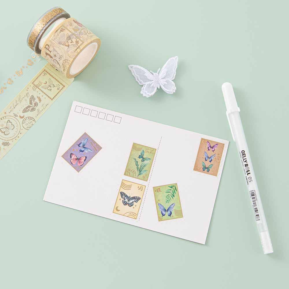 Tsuki ‘Flutter + Dream’ Washi Tapes by Notebook Therapy x Pelinkan on postcard with white gelly pen and butterfly on mint background