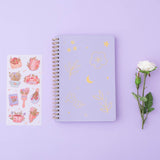 Lilac Taro Tsuki Floral ringbound bullet journal with free sticker sheet on lilac background