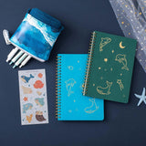 Tsuki Ocean Edition Ring Bound notebooks in deep teal with free sticker sheet and Ocean washi tape and starfish on dark blue background