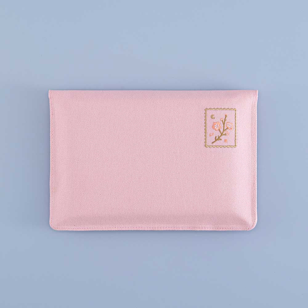 Tsuki ‘Sakura Journey’ Notebook Pouch on light blue background