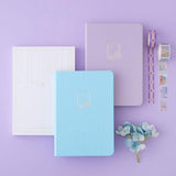 Tsuki Endless Summer Limited Edition Bullet Journals in Lilac Bloom and Petal Blue with eco-friendly gift box packaging and Tsuki Endless Summer washi tape rolls with light blue hydrangea flowers on lilac background