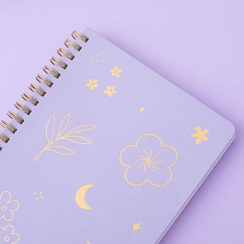 Close up on lilac taro cover Tsuki ringbound notebook on lilac background
