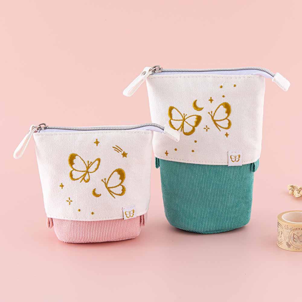 Tsuki ‘Flutter + Dream’ Pop-Up Pencil Cases by Notebook Therapy x Pelinkan in teal and pastel pink with Tsuki ‘Flutter + Dream’ Washi Tapes by Notebook Therapy x Pelinkan in pastel pink background