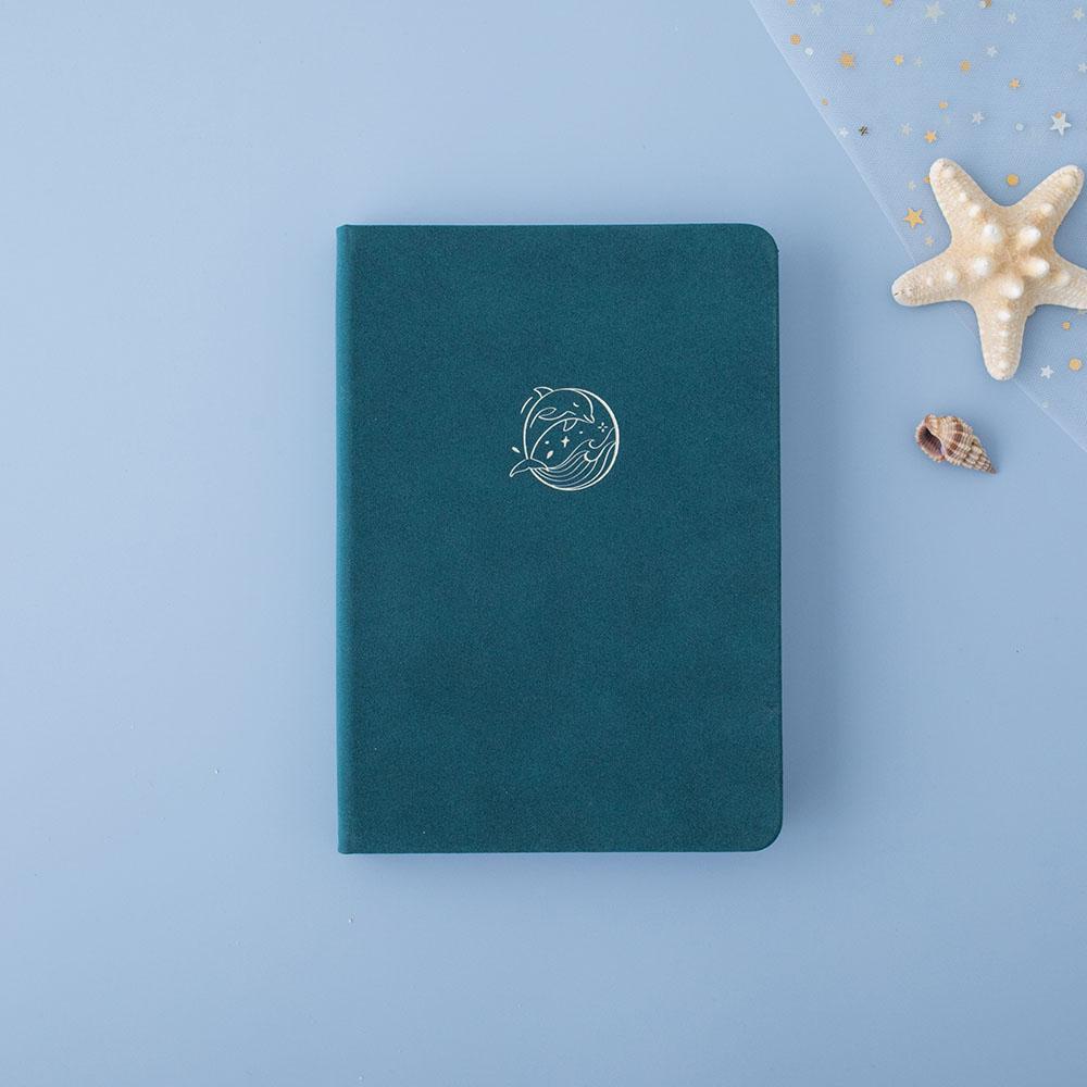 Tsuki sea green velvet Dolphin Days notebook with starfish on blue background