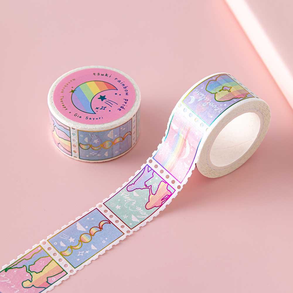 Close up of Tsuki Rainbow Pride Washi Tape on light pink background
