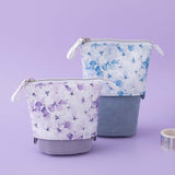 Tsuki Endless Summer Pop-Up Pencil cases in Lilac Bloom and Petal Blue with Tsuki Endless Summer Washi Tape roll in lilac background
