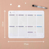 Tsuki Reusable Weekly Planner measuring 34 x 26 cm with dry erase marker on smooth wallpaper surface 