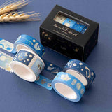 Close up of Tsuki ‘Moonlit Wish’ Washi Tape Set with wheat reeds on dark blue background