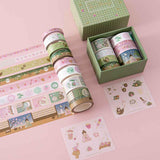 Close up of Tsuki ‘Matcha Ichigo’ Washi Tape Set with free sticker sheets on light pink background