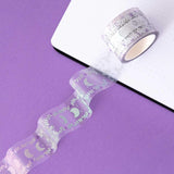 Close up of Tsuki ‘Moonlit Spell’ Washi Tape on open Tsuki 'Moonlit Spell' Limited Edition Holographic Bullet Journal page on purple background
