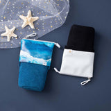 Tsuki Ocean Edition pop up standing pencil cases in Orca Black and Ocean Blue at an angle with starfish on dark blue background