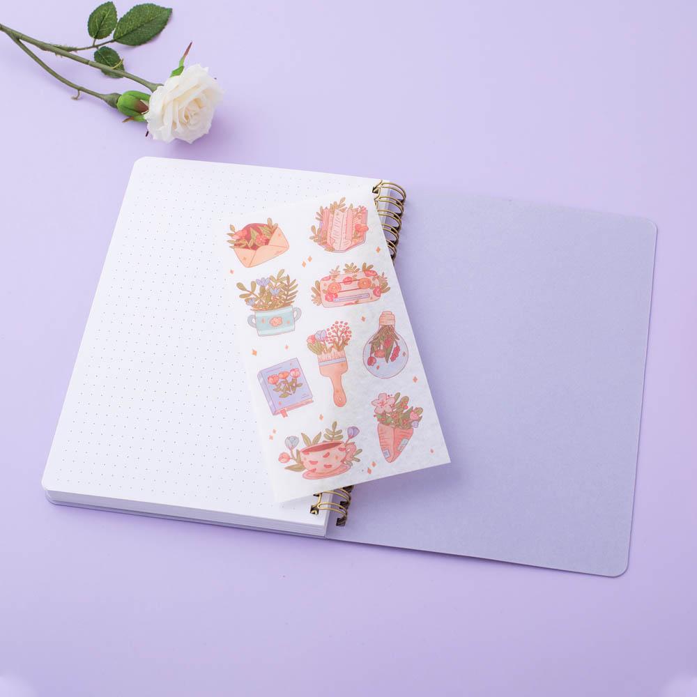 Tsuki lilac taro floral ringbound notebook open page with free sticker sheet in lilac background