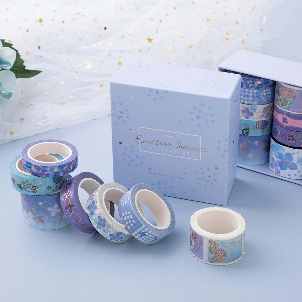 Tsuki Endless Summer Washi Tape Set with eco-friendly gift box packaging and sparkly netting on light blue background