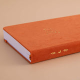 Spine of Tsuki ‘Kitsune’ Limited Edition Fox Bullet Journal on beige background