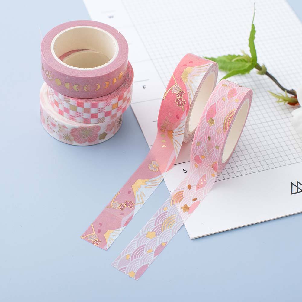 Tsuki 'Sakura Edition' Washi Tapes on white card with green leaves on light blue background