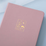 Tsuki 'Sakura' Limited Edition Bullet Journal in blush pink on light blue background