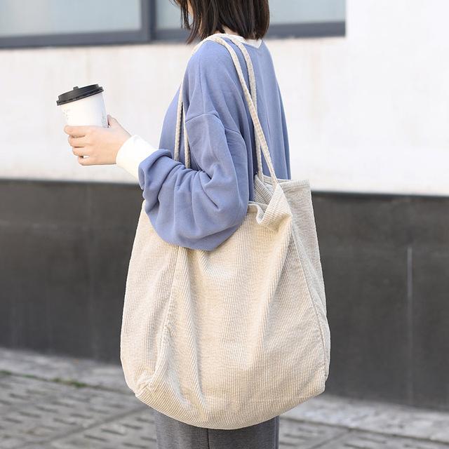 https://notebooktherapy.com/cdn/shop/products/Women-Fashion-Corduroy-Shoulder-Bag-Large-Capacity-Female-Big-Tote-Handbag-Folding-Reusable-Shopping-Bags-ThinBeige_0.jpg?v=1571452104