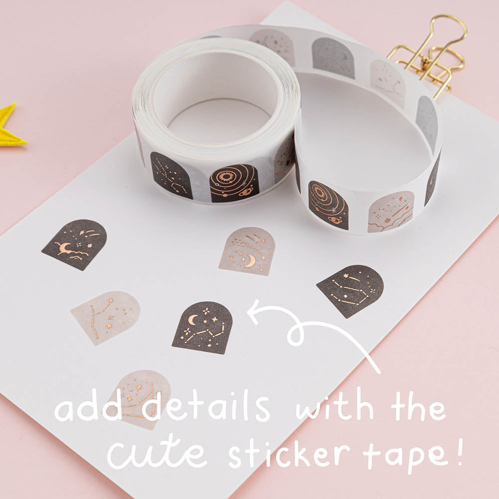 Constellations washi tape sticker roll swatched on white card with white text that says “add details with the cute sticker tape!”