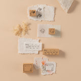 Fower stamp, airmail stamp, date stamp and memo stamp on textured paper