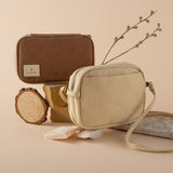 Styled photo of Hinoki cream travel pouch and brown corduroy pencil case