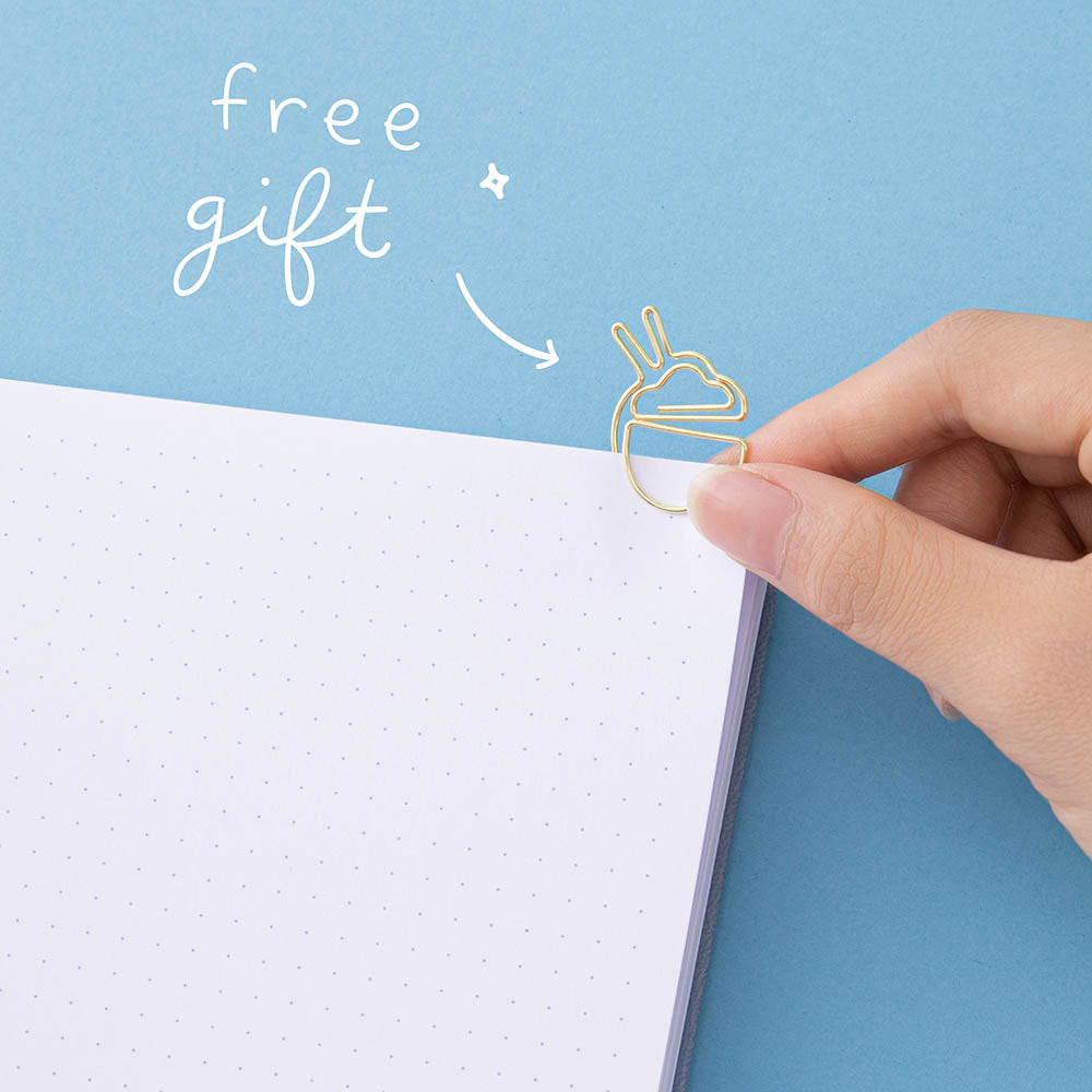 Ramen bowl gold paperclip on a page with the text “free gift” in white