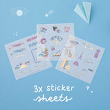 3 sticker sheets with gold foil details on blue background